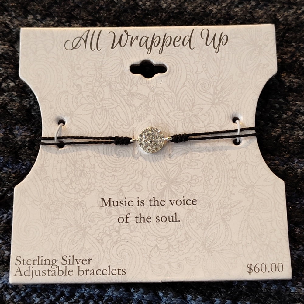 NWT!! ALL WRAPPED UP STERLING SILVER BRACELET